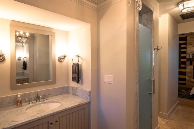 bathroom featuring vanity and crown molding