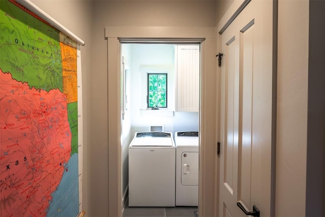 laundry room with cabinets and washing machine and dryer