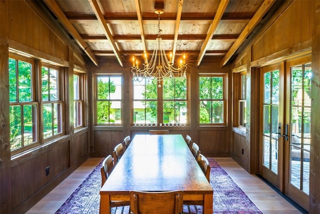 sunroom with beamed ceiling, wooden ceiling, and a chandelier