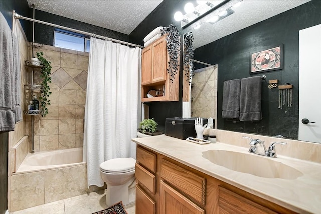 full bathroom featuring vanity, toilet, shower / bathtub combination with curtain, tile patterned floors, and a textured ceiling