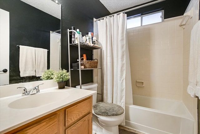 full bathroom with shower / bath combo, vanity, a textured ceiling, and toilet