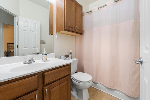 full bathroom with tile patterned flooring, vanity, shower / tub combo, and toilet