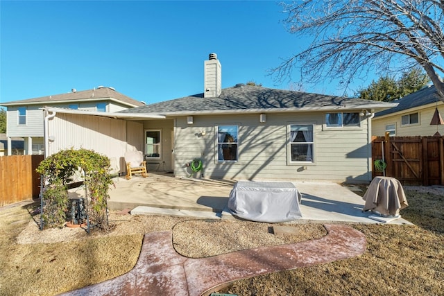 rear view of house featuring a patio area