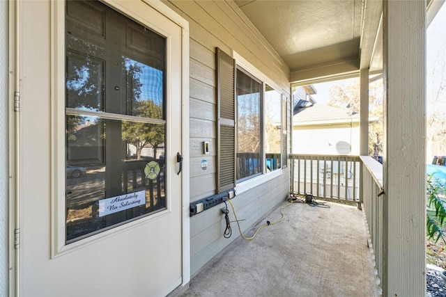 balcony featuring covered porch