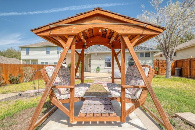 view of patio / terrace featuring a gazebo and a fenced backyard