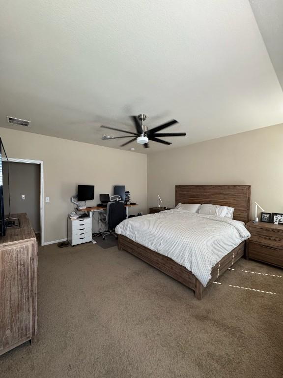 carpeted bedroom with ceiling fan