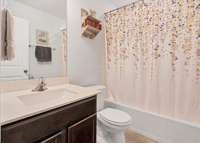 full bathroom featuring vanity, tile patterned floors, toilet, and shower / bathtub combination with curtain