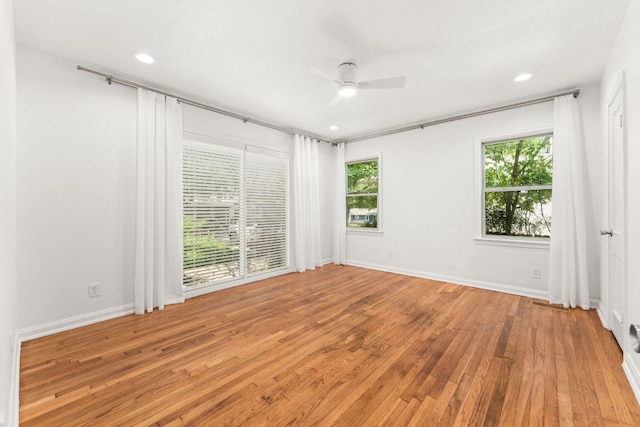 2105 Bowman Ave, Austin, TX 78703 - spare room featuring ceiling fan, wood finished floors, baseboards, and recessed lighting