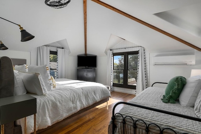 bedroom featuring hardwood / wood-style floors, vaulted ceiling with beams, a wall mounted AC, and multiple windows