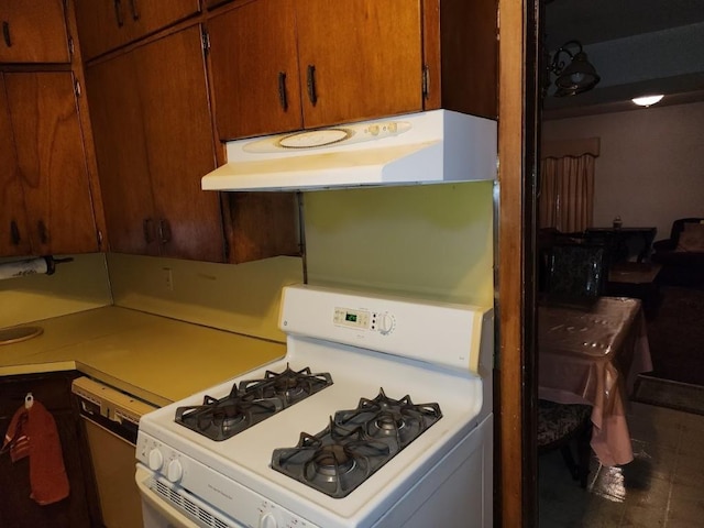 kitchen with dishwashing machine and white range with gas stovetop