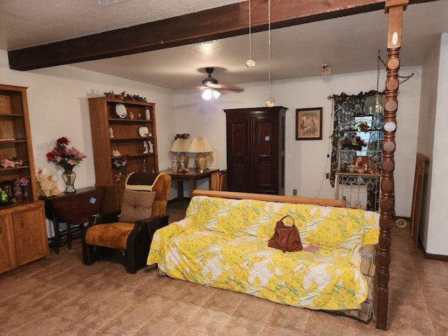 living room featuring beam ceiling and ceiling fan