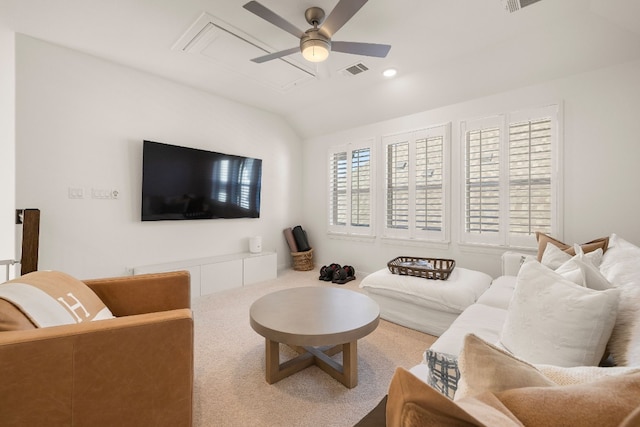 living room with vaulted ceiling, ceiling fan, and carpet flooring