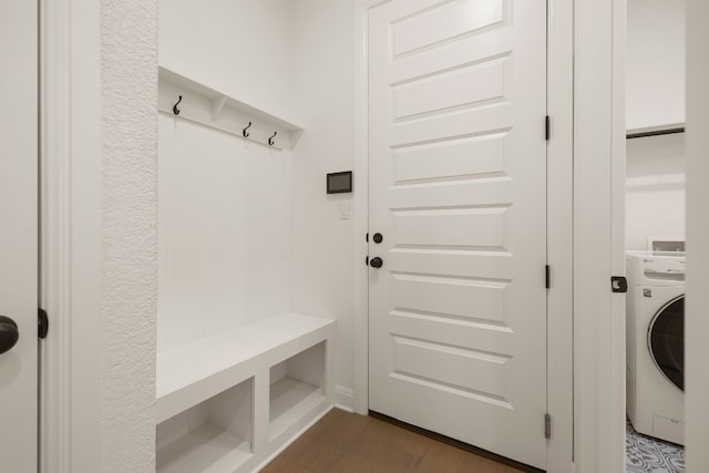 mudroom featuring dark hardwood / wood-style floors and washer / dryer