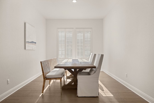 dining room featuring dark hardwood / wood-style flooring