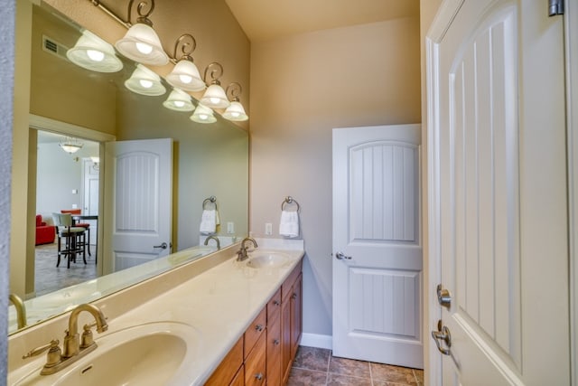 bathroom featuring vanity and tile patterned flooring