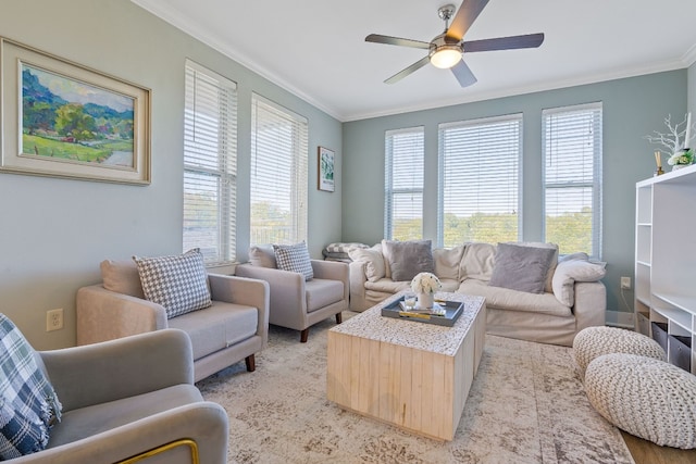 living room featuring crown molding and ceiling fan