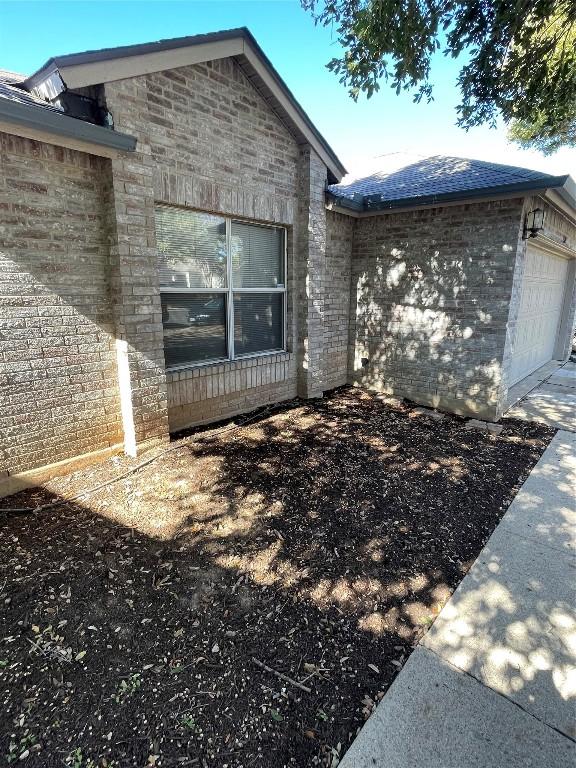 view of home's exterior featuring a garage