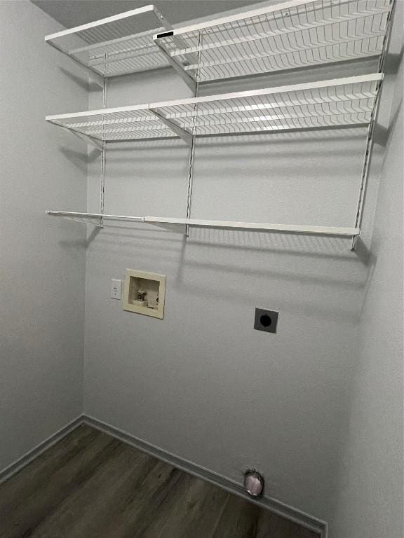 laundry room with dark hardwood / wood-style flooring, washer hookup, and hookup for an electric dryer