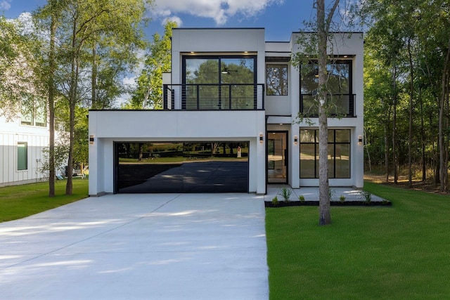 contemporary home featuring a front yard