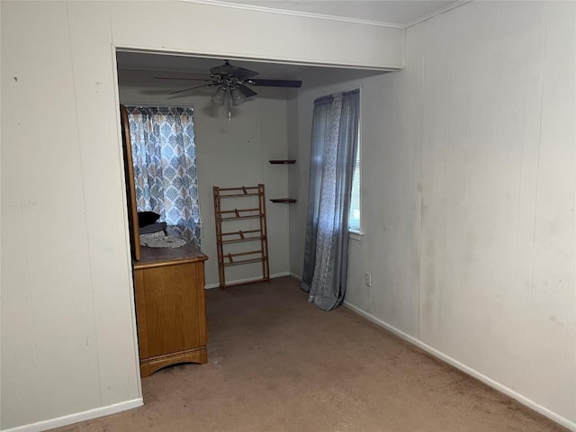 interior space featuring ceiling fan