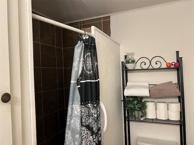 bathroom featuring a shower with curtain