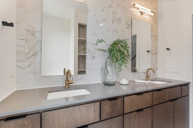 bathroom with double vanity and a sink