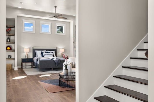 bedroom with wood-type flooring