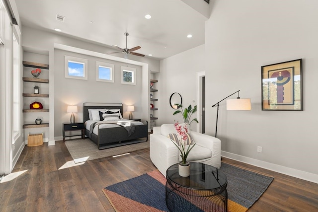 bedroom featuring dark hardwood / wood-style flooring