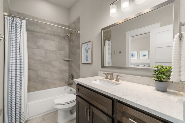 full bathroom with tile patterned flooring, vanity, shower / bathtub combination with curtain, and toilet