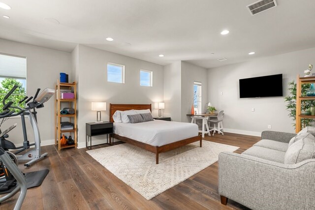 821 Laughing Dog Ct, Leander, TX 78641 - bedroom featuring recessed lighting and dark wood-type flooring
