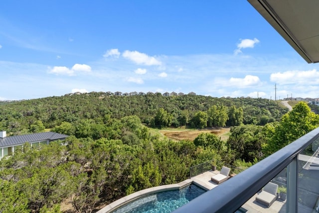 821 Laughing Dog Ct, Leander, TX 78641 - balcony featuring a forest view