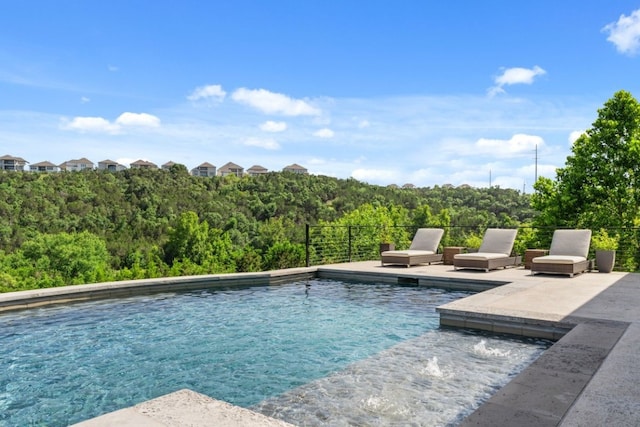 821 Laughing Dog Ct, Leander, TX 78641 - view of pool featuring a patio and a forest view