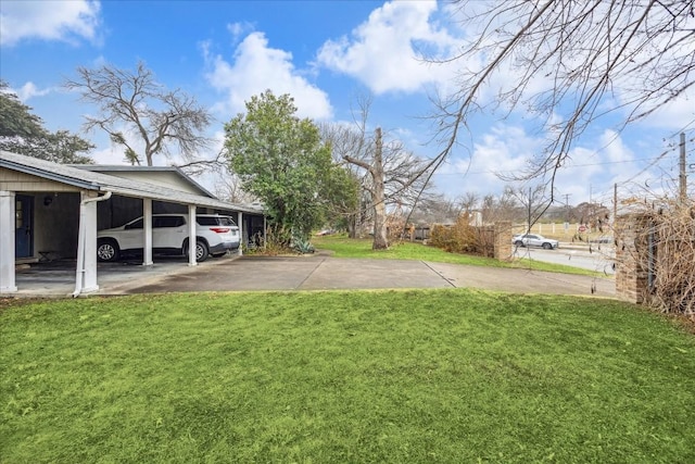 view of yard with a carport