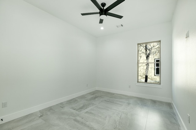 empty room featuring ceiling fan