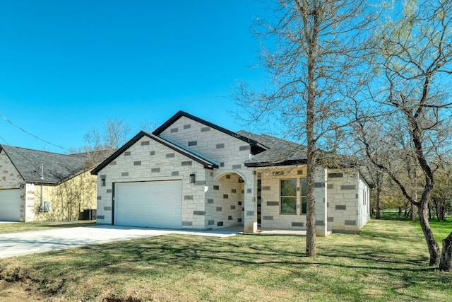 view of front of house featuring a garage, central AC, and a front lawn