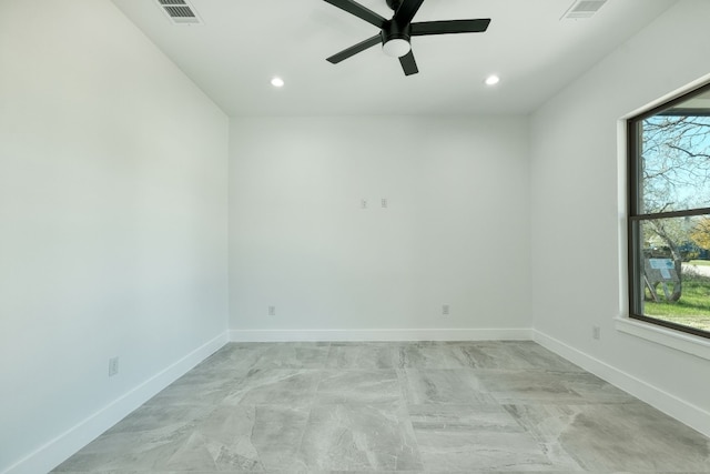 spare room featuring ceiling fan