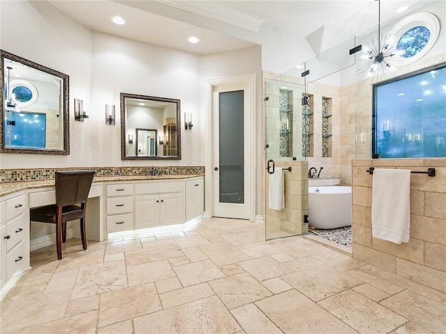 bathroom featuring vanity, separate shower and tub, and tile walls