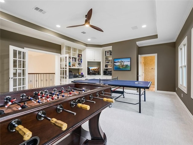 3844 Hunterwood Pt, Austin, TX 78746 - playroom with a ceiling fan, recessed lighting, light colored carpet, ornamental molding, and french doors