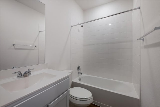 full bathroom with washtub / shower combination, vanity, and toilet