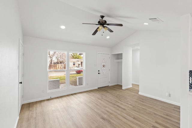 unfurnished room featuring vaulted ceiling, ceiling fan, and light hardwood / wood-style floors