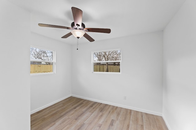 unfurnished room featuring ceiling fan and light hardwood / wood-style flooring