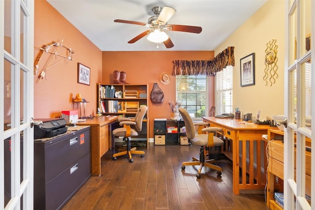 home office featuring dark wood-type flooring, french doors, and ceiling fan