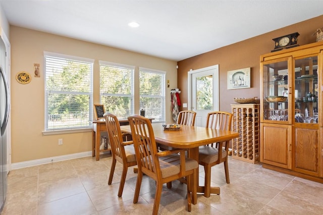 dining room featuring light tile patterned floors