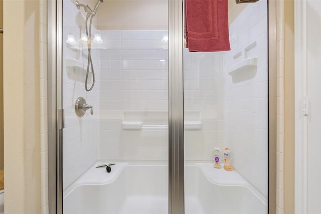 bathroom featuring an enclosed shower