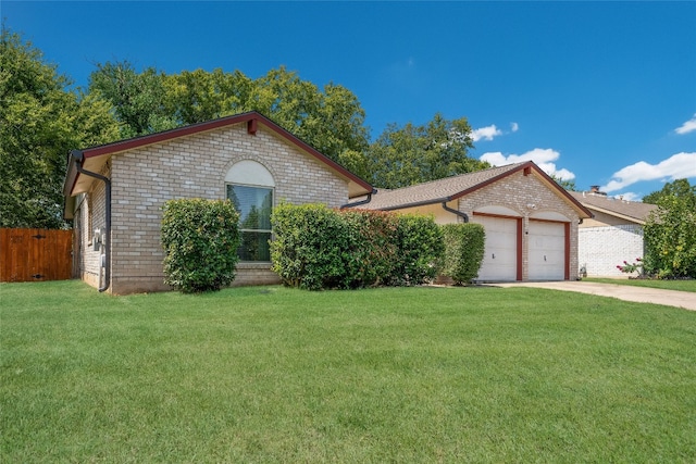 single story home featuring fence, a front lawn, brick siding, a garage, and concrete driveway