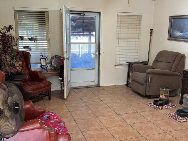 living area with light tile patterned floors