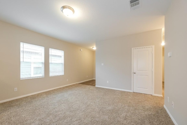 view of carpeted spare room