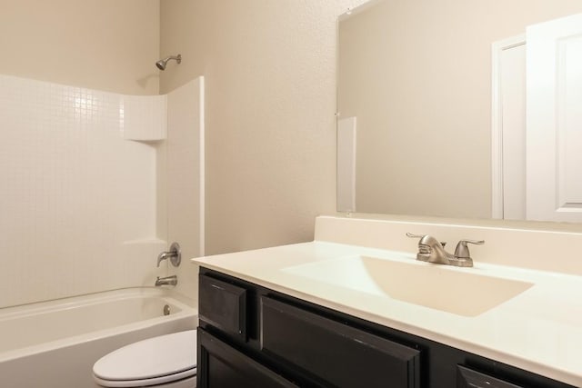 full bathroom with vanity, toilet, and shower / washtub combination