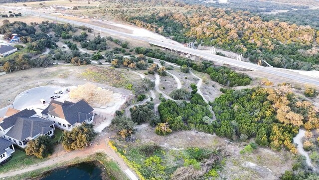 232 Flora Springs Cv, Liberty Hill, TX 78642 - aerial view featuring a view of trees