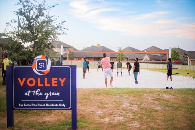 232 Flora Springs Cv, Liberty Hill, TX 78642 - view of home's community with volleyball court and a lawn